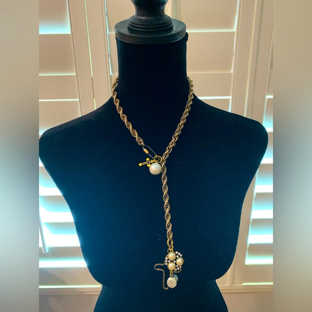 One of a kind, handcrafted necklace. Made with repurposed, costume jewelry.